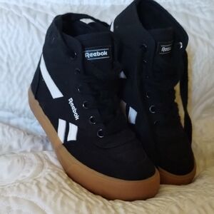 Reebok Kids Black and White High-Top Sneakers with Gum Sole.
